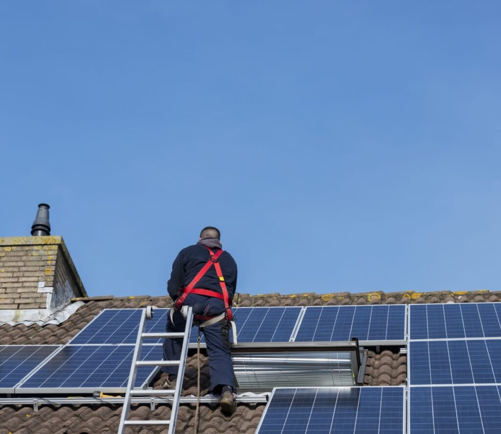 Residential solar panels installed on a suburban home roof